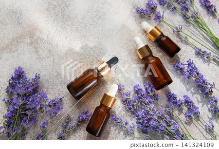 Lavender essential oil serum bottles for aromatherapy skincare Lavender essential oil serum bottles for aromatherapy skincare 141324109