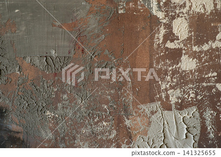 Abstract brown and grey textured background with rough plaster smears, scratches, and distressed grunge effect. 141325655