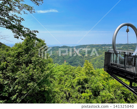 A view of Osaka from the Vow Terrace SORANI at the Myojin-yama Nature Forest Observation Deck in Oji-cho, Nara Prefecture. A view of Osaka from the Vow Terrace SORANI at the Myojin-yama Nature Forest Observation Deck in Oji-cho, Nara Prefecture. 141325840