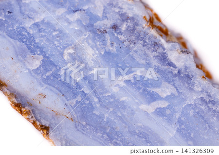 Macro mineral blue agate in the rock on white background 141326309
