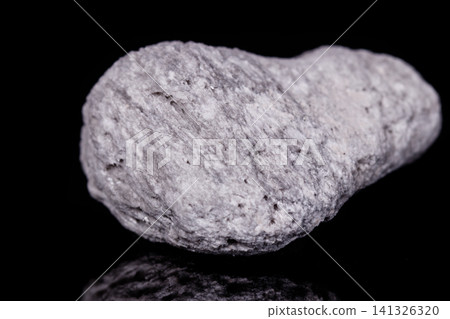 Macro mineral stone Pumice on black background Macro mineral stone Pumice on black background 141326320