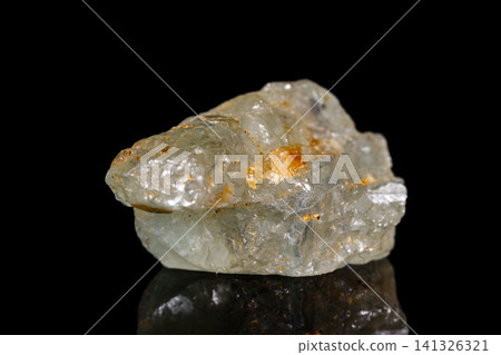 Macro mineral stone Topaz on black background Macro mineral stone Topaz on black background 141326321