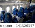 Warsaw, Poland, May 10 2018: View through premium economy cabin towards economy class on a flight to the USA 141326347