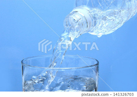 Mineral water 27 Water poured into a glass Mineral water 27 Water poured into a glass 141326703