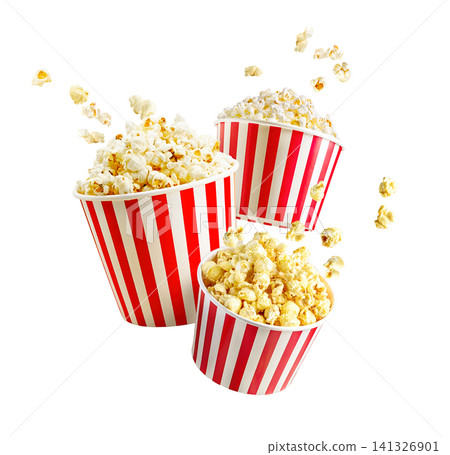 Popcorn bursts from striped paper containers Popcorn bursts from striped paper containers 141326901
