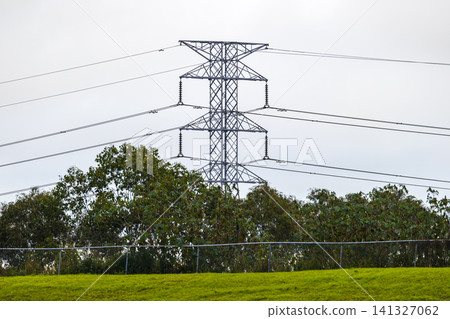 An Electrical Transmission Tower supporting High Voltage Power Lines An Electrical Transmission Tower supporting High Voltage Power Lines 141327062