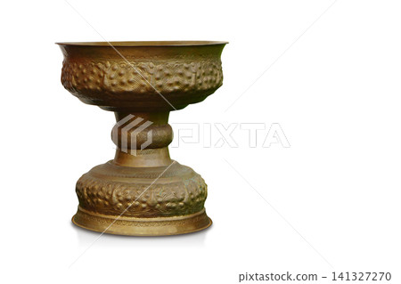 Antique tall brass pedestal tray on a white background, object, ancient, decor, collection, copy space Antique tall brass pedestal tray on a white background, object, ancient, decor, collection, copy space 141327270