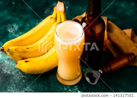Craft banana beer or cider, non alcoholic drink Craft banana beer or cider, non alcoholic drink 141327581