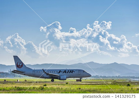 Airplane taxiing at Sendai Airport in summer, from view #27, Natori City, Miyagi Prefecture. Airplane taxiing at Sendai Airport in summer, from view #27, Natori City, Miyagi Prefecture. 141329175