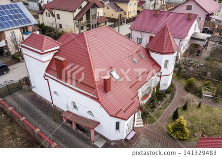 Aerial top view of suburb area with nice houses and cars on sunny day. Aerial top view of suburb area with nice houses and cars on sunny day. 141329483