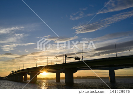 Bridge illuminated by the morning sun Bridge illuminated by the morning sun 141329976