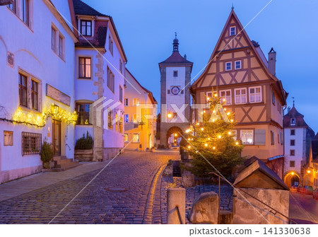 Christmas tree and historic street in Rothenburg ob der Tauber, Bavaria, Germany at dusk Christmas tree and historic street in Rothenburg ob der Tauber, Bavaria, Germany at dusk 141330638