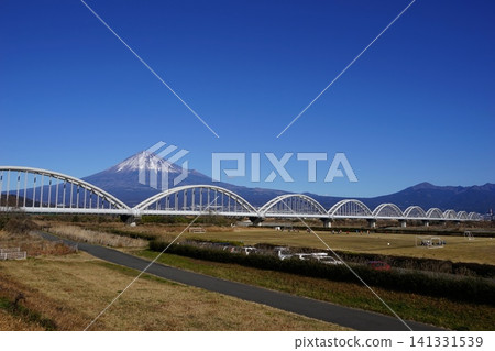 Under a clear sky, Mt. Fuji, Mt. Ashitaka, and the Fujikawa Aqueduct. January Mt. Fuji 2087 Mt. Ashitaka and Fujikawa Aqueduct Bridge Under a clear sky, Mt. Fuji, Mt. Ashitaka, and the Fujikawa Aqueduct. January Mt. Fuji 2087 Mt. Ashitaka and Fujikawa Aqueduct Bridge 141331539