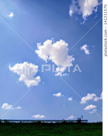 clouds floating in the summer sea clouds floating in the summer sea 141331570