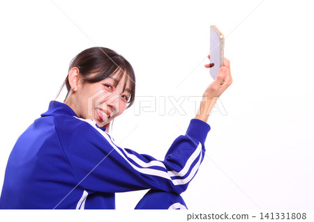A woman was looking at her smartphone. A woman was looking at her smartphone. 141331808