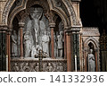 Architectural close-up of the elaborate Reredos with religious sculptures and decorative details 141332936
