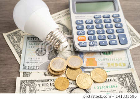Cost of electric utilities with light bulb for payment. Cost of electric utilities with light bulb for payment. 141333596