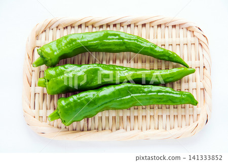 Sweet peppers (Manganji variety) on a sieve Sweet peppers (Manganji variety) on a sieve 141333852