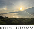 A sea of clouds and a sun dog over Lake Shirakaba as seen from Kurumayama Plateau; sunrise and summer plateau scenery; Nagano Prefecture 141333872