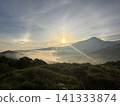 A sea of clouds and a sun dog over Lake Shirakaba as seen from Kurumayama Plateau; sunrise and summer plateau scenery; Nagano Prefecture 141333874