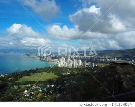 A breathtaking view of Waikiki and the beautiful Pacific Ocean from the summit of Diamond Head. A breathtaking view of Waikiki and the beautiful Pacific Ocean from the summit of Diamond Head. 141334094