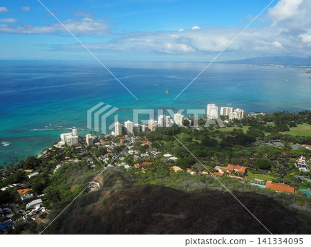 A breathtaking view of Waikiki and the beautiful Pacific Ocean from the summit of Diamond Head. A breathtaking view of Waikiki and the beautiful Pacific Ocean from the summit of Diamond Head. 141334095