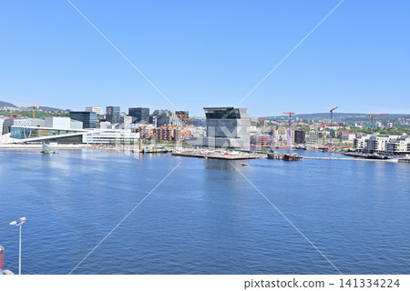 From the DFDS ship, the Oslo cityscape is visible in the background, with the Opera House and Munch Museum in the background. From the DFDS ship, the Oslo cityscape is visible in the background, with the Opera House and Munch Museum in the background. 141334224