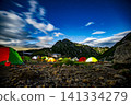Dawn over Mt. Tsurugi and the campsite, with a beautiful blue sky and clouds. 141334279