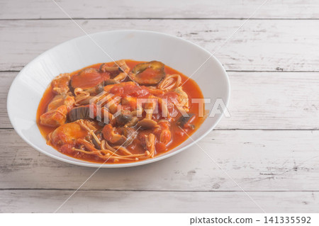 Chicken, eggplant, and mushroom tomato stew Chicken, eggplant, and mushroom tomato stew 141335592