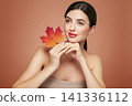 Autumn portrait of beautiful woman with clean fresh skin 141336112
