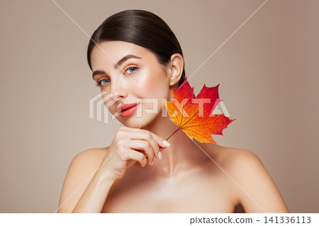 Autumn portrait of beautiful woman with clean fresh skin Autumn portrait of beautiful woman with clean fresh skin 141336113