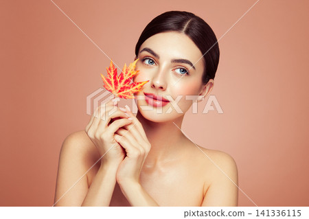 Autumn portrait of beautiful woman with clean fresh skin Autumn portrait of beautiful woman with clean fresh skin 141336115