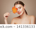 Autumn portrait of beautiful woman with clean fresh skin 141336133