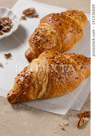 two freshly baked croissants two freshly baked croissants 141336889