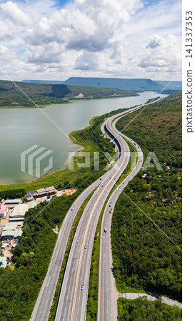 Drone shot The M6 motorway Nakhon Ratchasima Province - Bang Pa-in Lam Ta Khong River and Mountain. Motorway Korat Thailand 141337353