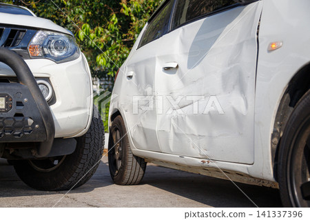Car accident damage after collision on urban road 141337396