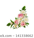 Small pink rose flowers, alstroemeria, chrysanthemums and green leaves of ruscus in a corner floral arrangement isolated on white background 141338662