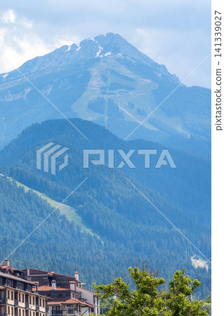 Bansko, Pirin, Bulgaria summer empty ski slopes and chairlift in green pine tree mountains Bansko, Pirin, Bulgaria summer empty ski slopes and chairlift in green pine tree mountains 141339027