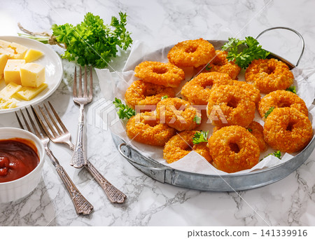 Crispy Mozzarella Party Donuts on a serving tray Crispy Mozzarella Party Donuts on a serving tray 141339916