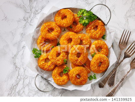 Crisp Gouda Rounds on a marble table Crisp Gouda Rounds on a marble table 141339925