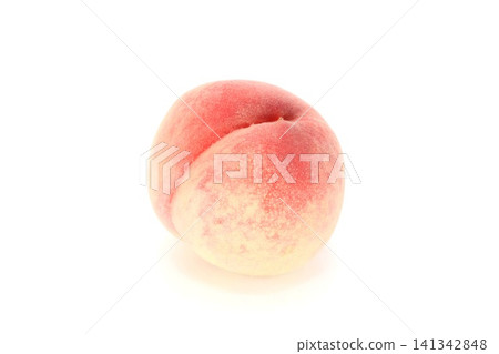 A whole peach against a bright background. A whole peach against a bright background. 141342848