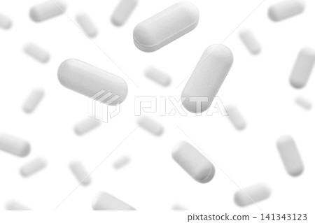 Falling white medicine pills capsule isolated on white background Falling white medicine pills capsule isolated on white background 141343123
