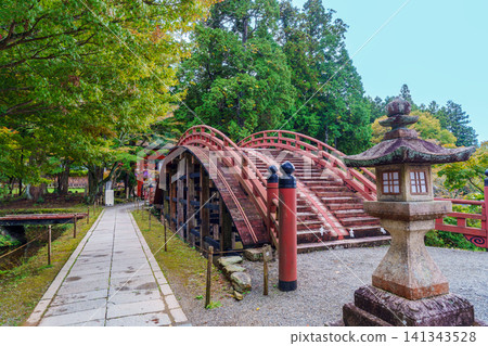 The red arched bridge at Niutsuhime Shrine The red arched bridge at Niutsuhime Shrine 141343528