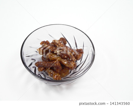 Deep-fried burdock root with skin on, sweet and spicy Deep-fried burdock root with skin on, sweet and spicy 141343560