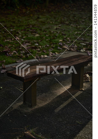 A landscape with a bench 141344859