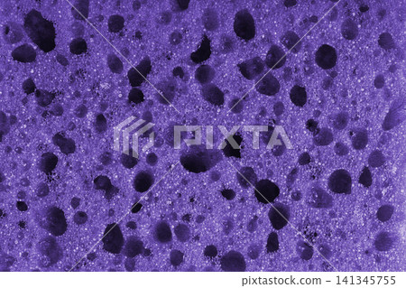 Macro, closeup of purple foam sponge texture with porous, spongy and bubbly pattern background Macro, closeup of purple foam sponge texture with porous, spongy and bubbly pattern background 141345755
