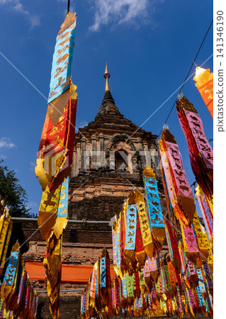 Wat Lok Moli Temple in Chiang Mai and colorful prayer flags 141346190