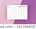 September 2027 blank calendar on purple two tone color background. 141346658