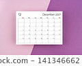 December 2027 blank calendar on purple two tone color background. 141346662