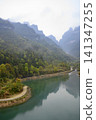 View of the river in the mist in the mountains near Zhangjiajie city in China 141347255